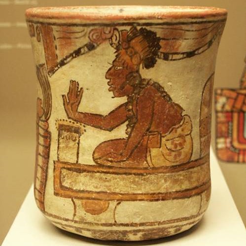 Maya goblet decorated with the picture of a nobleman raising his hand